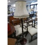 Cherry effect standard lamp base with floral tasseled shade