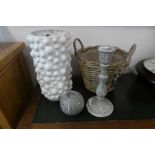 Group of candle sticks, green and white vases and small wicker basket