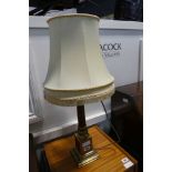 Brass table lantern with tapered cream shade