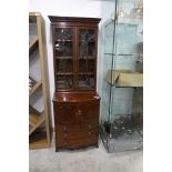 Dark stained wooden dresser and display cabinet with glass doors