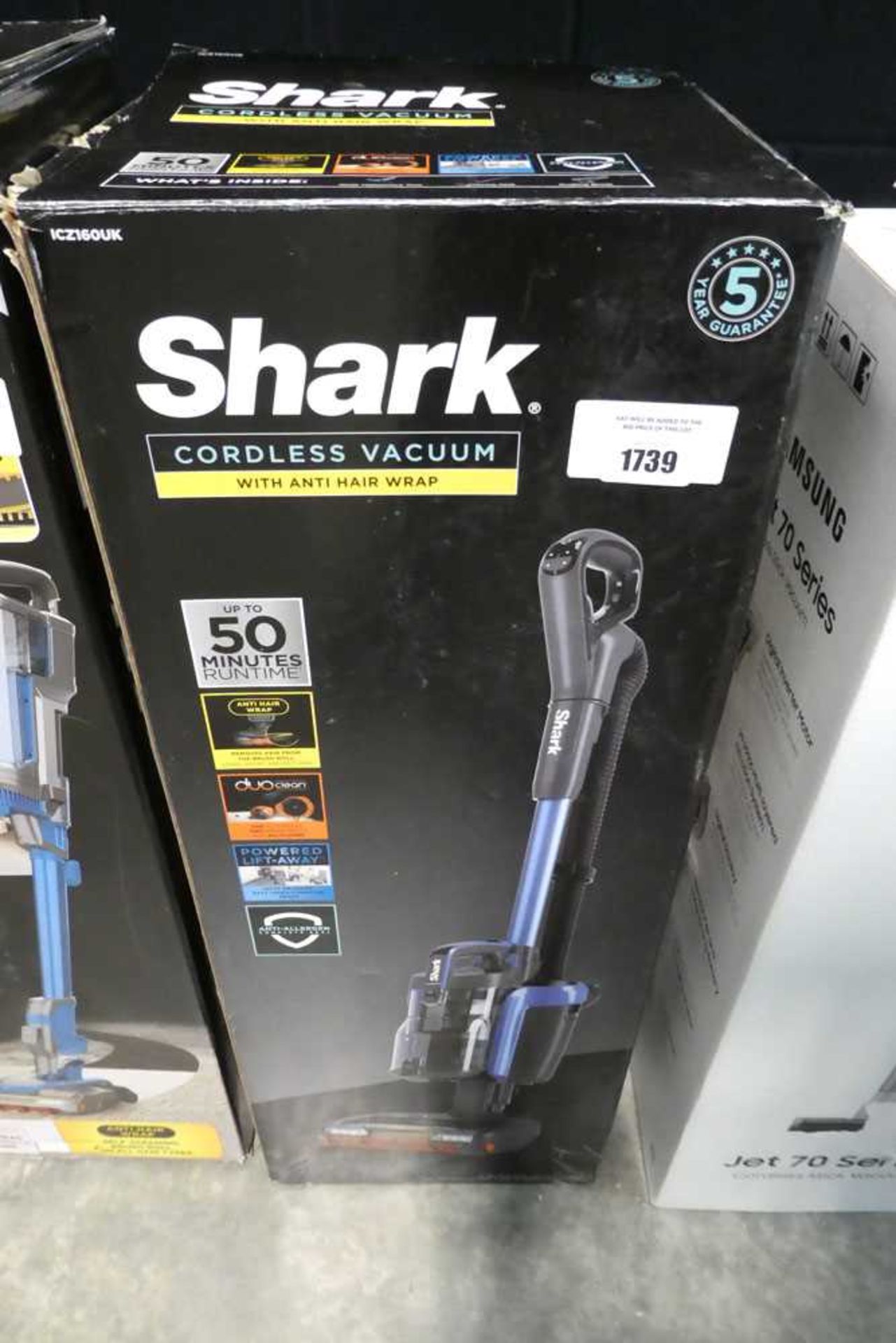 +VAT Shark cordless vacuum in box