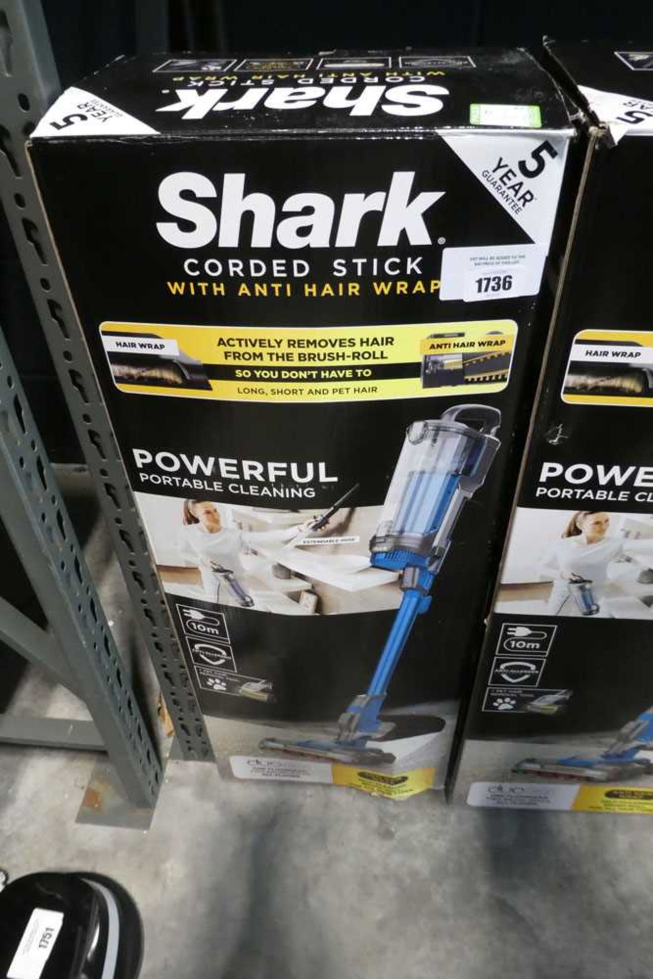 +VAT Shark corded stick vacuum cleaner in box