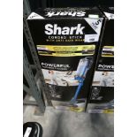 +VAT Shark corded stick vacuum cleaner in box
