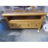 Oak TV cabinet with shelf and single drawer below