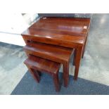 Nest of 3 mahogany coffee tables