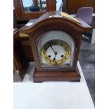 1920s oak cased striking mantle clock