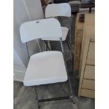 Pair of white and metal finish folding bar stools