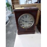 Striking mantle clock in mahogany case