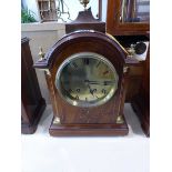 Edwardian inlaid mahogany striking mantle clock with brass finials