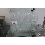 +VAT Large quantity of wine glassses, unboxed