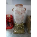 +VAT Terracotta white wash effect urn on gold coloured decorative plinth