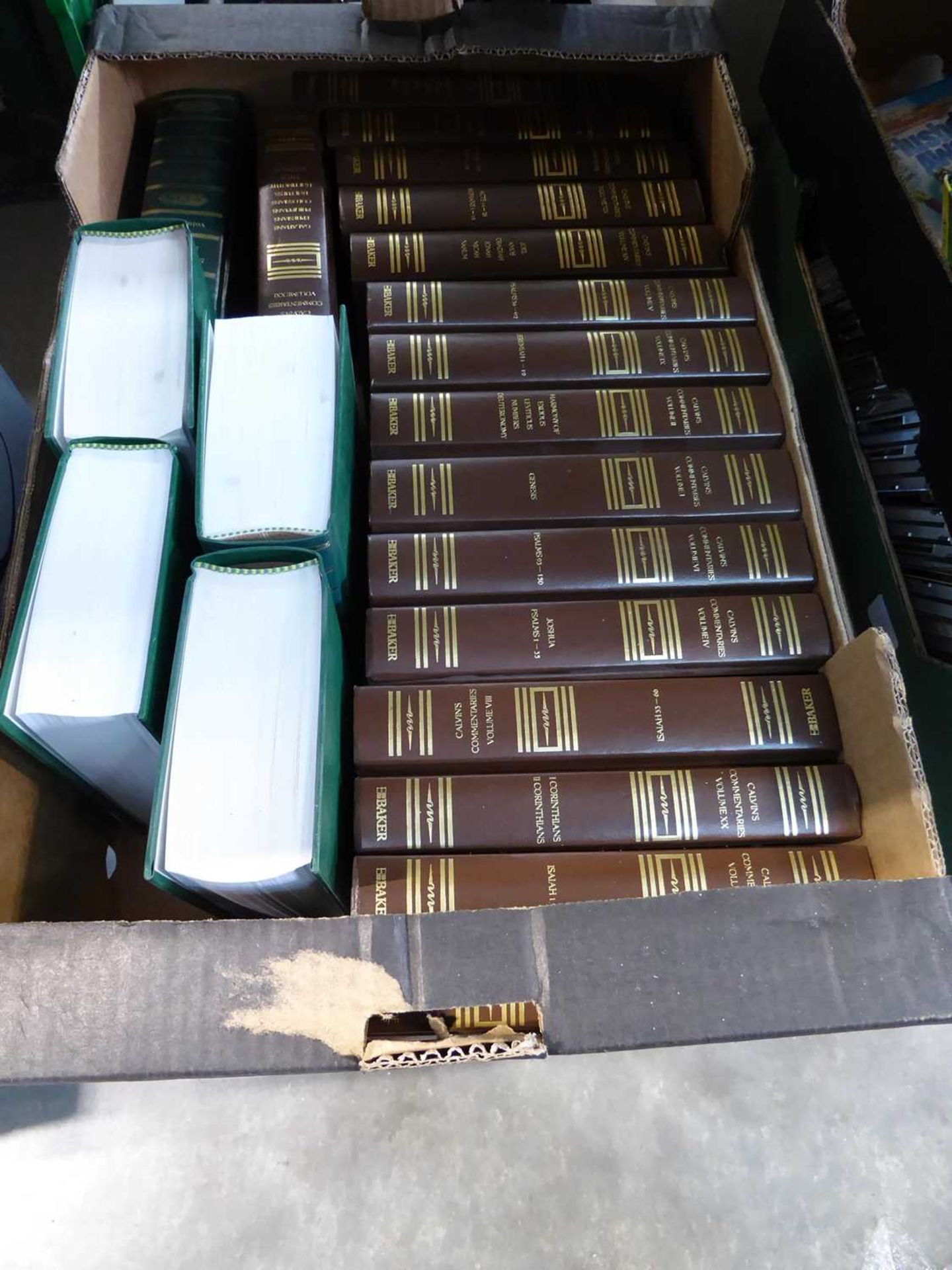 Box containing hard back Calvin books