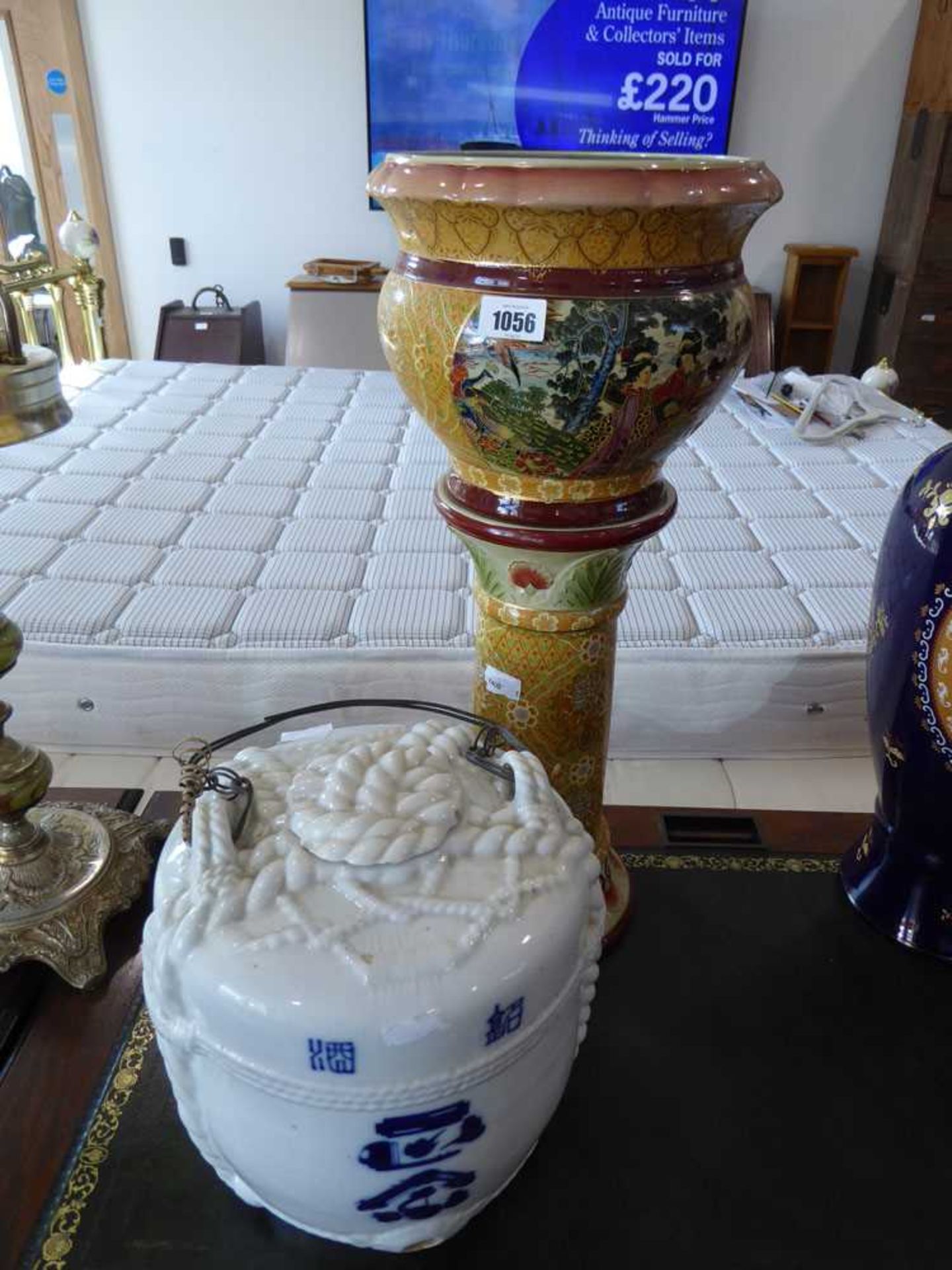 Oriental ceramic jardiniere and planter with blue and white ceramic lidded wine jar