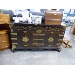 Oriental hardwood sideboard with brass door and drawer details