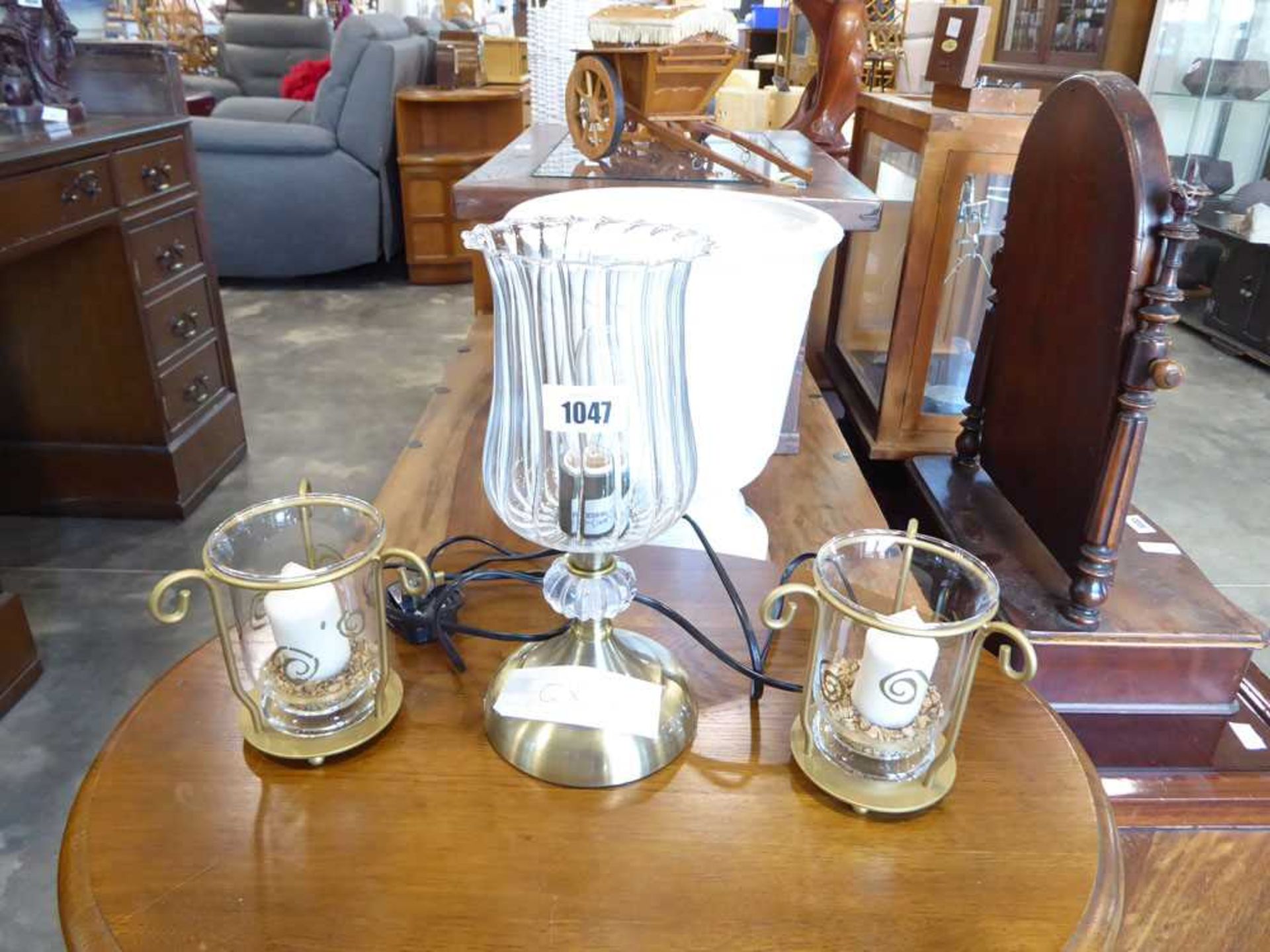 Pair of candle holders and 1 electric light with glass shade