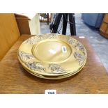 2 large ceramic serving platters and 2 gold coloured plates