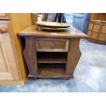 Dark oak single drawer coffee table with magazine pouches to sides