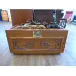 Oriental hard wood storage box with brass escutcheon and twin handles