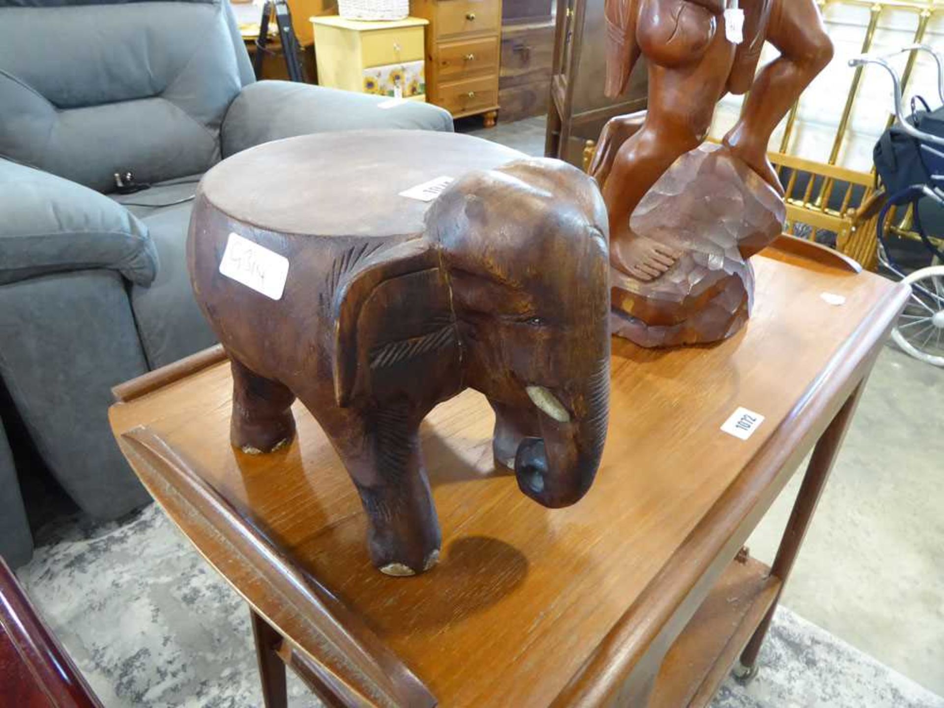 Carved elephant plant stand