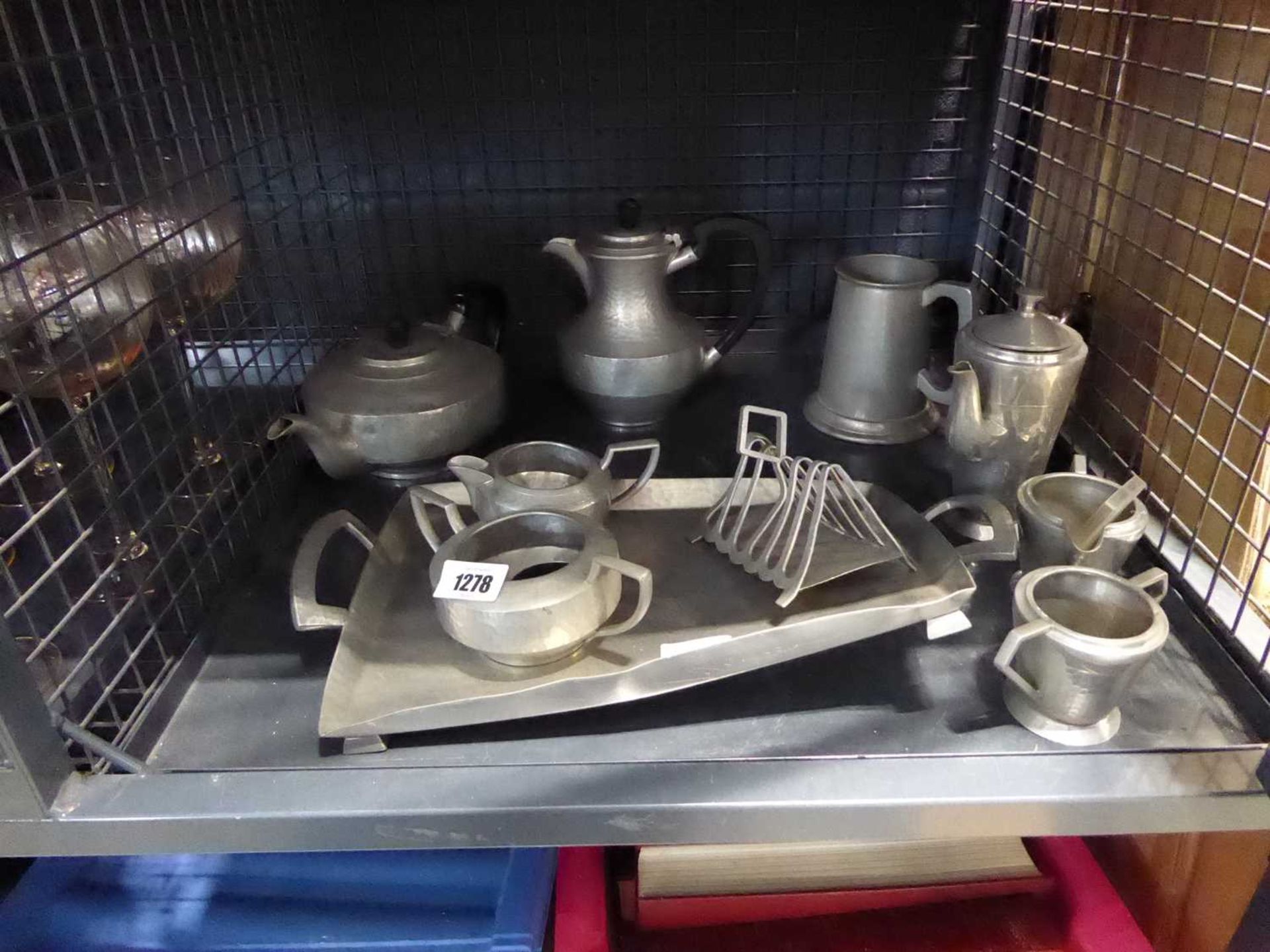 Various pewter items incl. toast racks, teapots and coffee pots