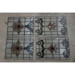 Approx. 11 reclaimed stained glass window panels of various sizes, having leaded