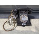 Mid 20th century telephone with pullout useful numbers tray