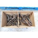 Wooden crate containing vintage spanners by Shelley, Ransomes, etc.