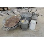 An assortment of galvanised items including 2x twin handled baths, 1x bucket, 2x small chicken