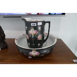 Black and floral patterned ceramic jug and bowl by Crown Devon Fieldings