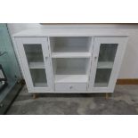 +VAT Modern white sideboard on tapered supports with 2 glass doors and single drawer to base