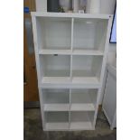 Modern pair of white IKEA Kallax storage units