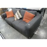 Modern grey 3-seater upholstered sofa on chrome supports