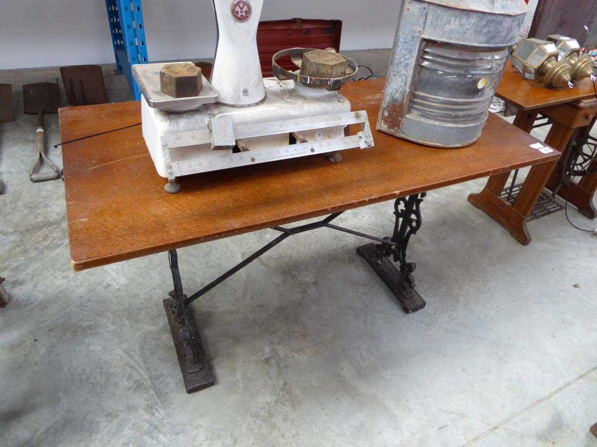 Dark oak bar table on a black painted cast iron frame