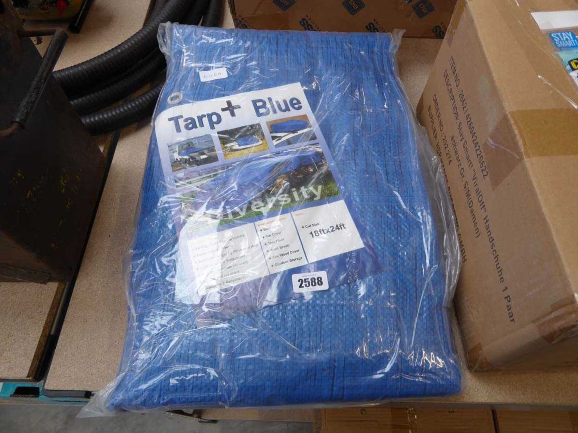Packaged 18'x24' blue tarpaulin