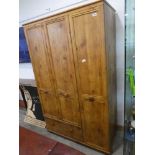 Modern pine effect triple front wardrobe with single drawer to base by Alstons Furniture, matching