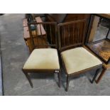 2 wooden frame spindle back dining chairs with green seat pads *Collector’s Item: Sold subject to