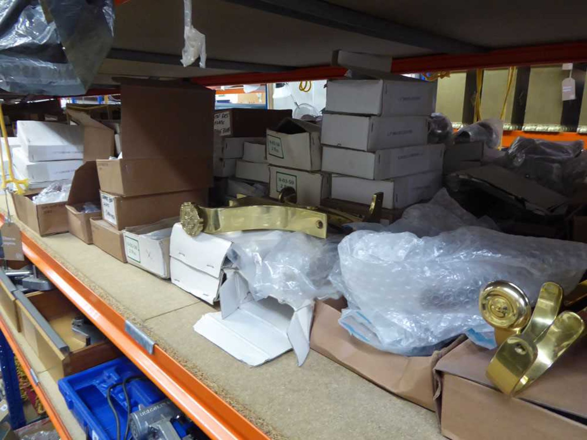 +VAT Large shelf of curtain rail fittings and similar components in brass, chrome, etc