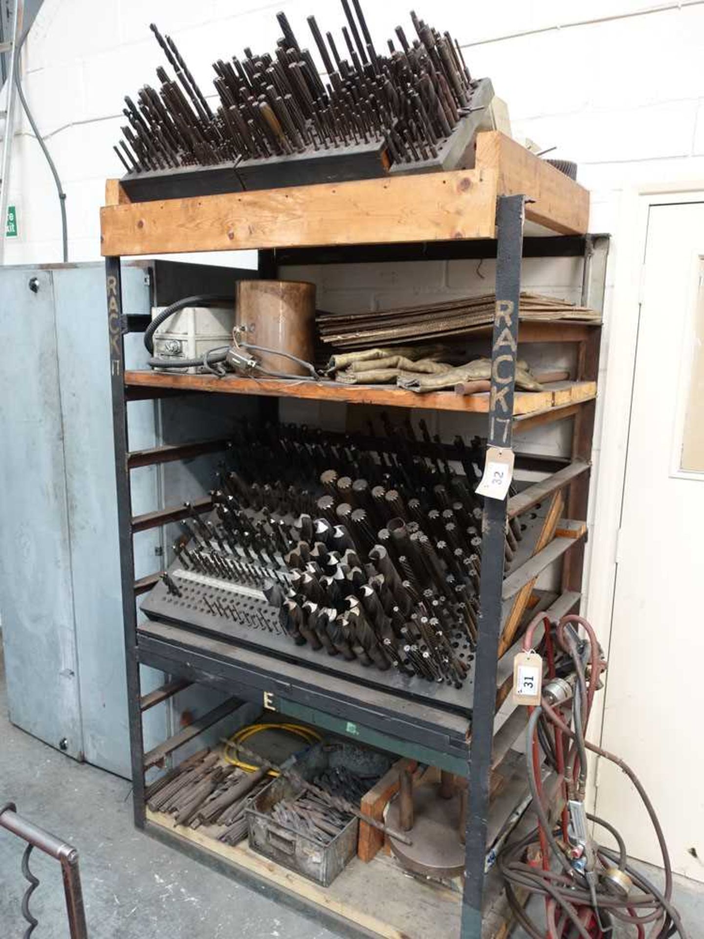 Welded steel rack containing heavy duty taper shank and other drills, reamers etc