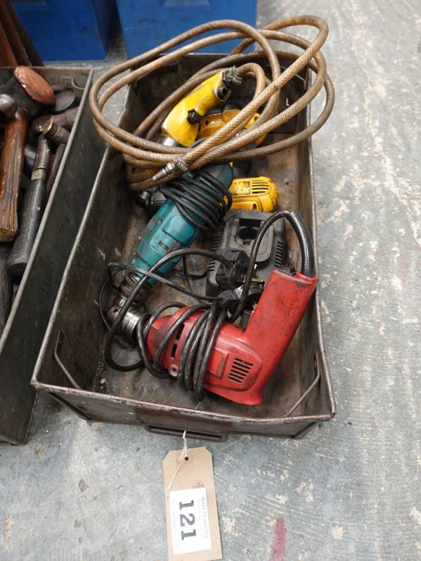 Metal tote with single phase Makita drill, Atlas Copco air drill and a Dewalt battery drill with