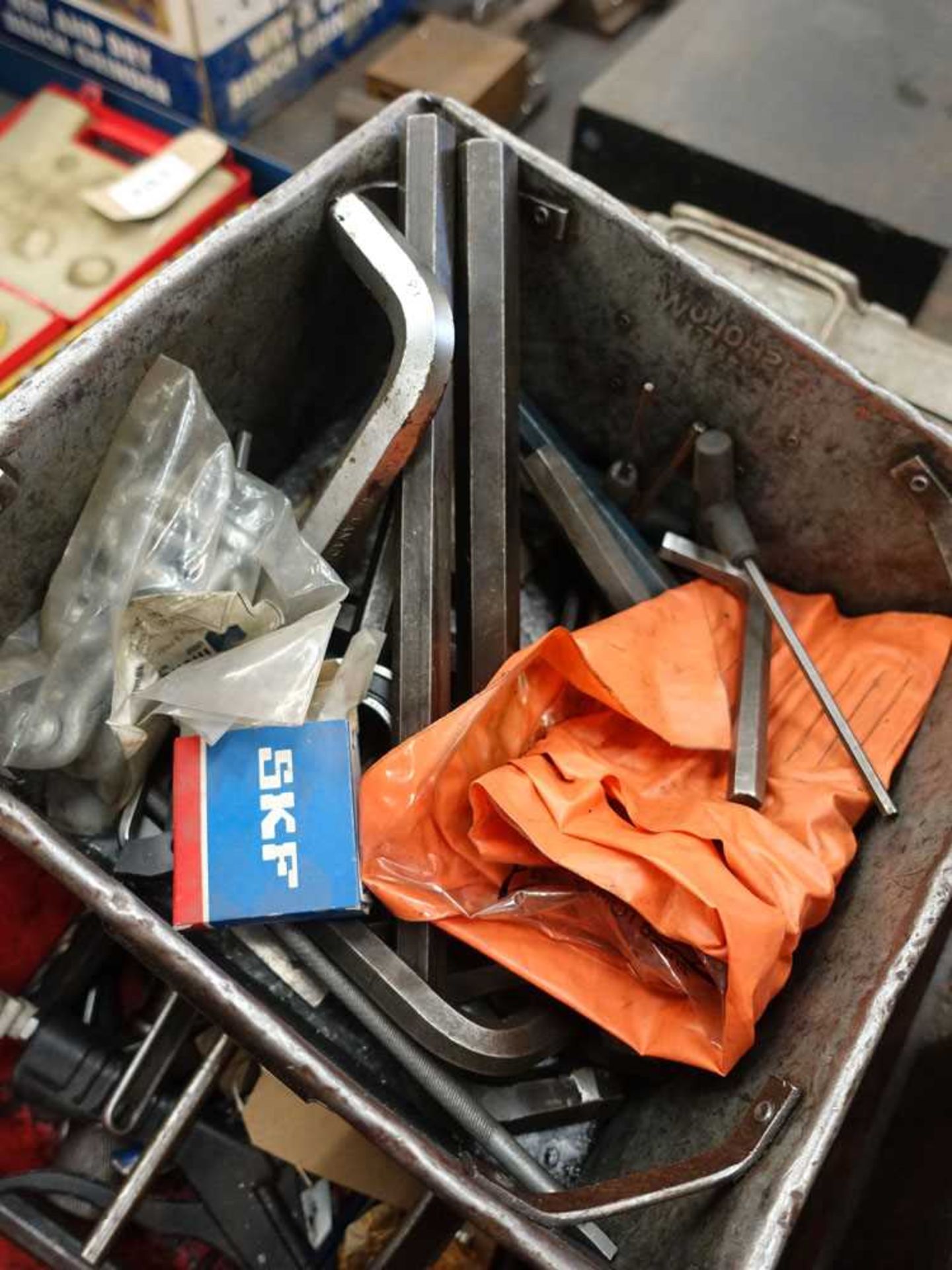 Red linbin with assorted hand tools inc. spanners, chisels, drill bits, metal tote with assorted - Image 2 of 4