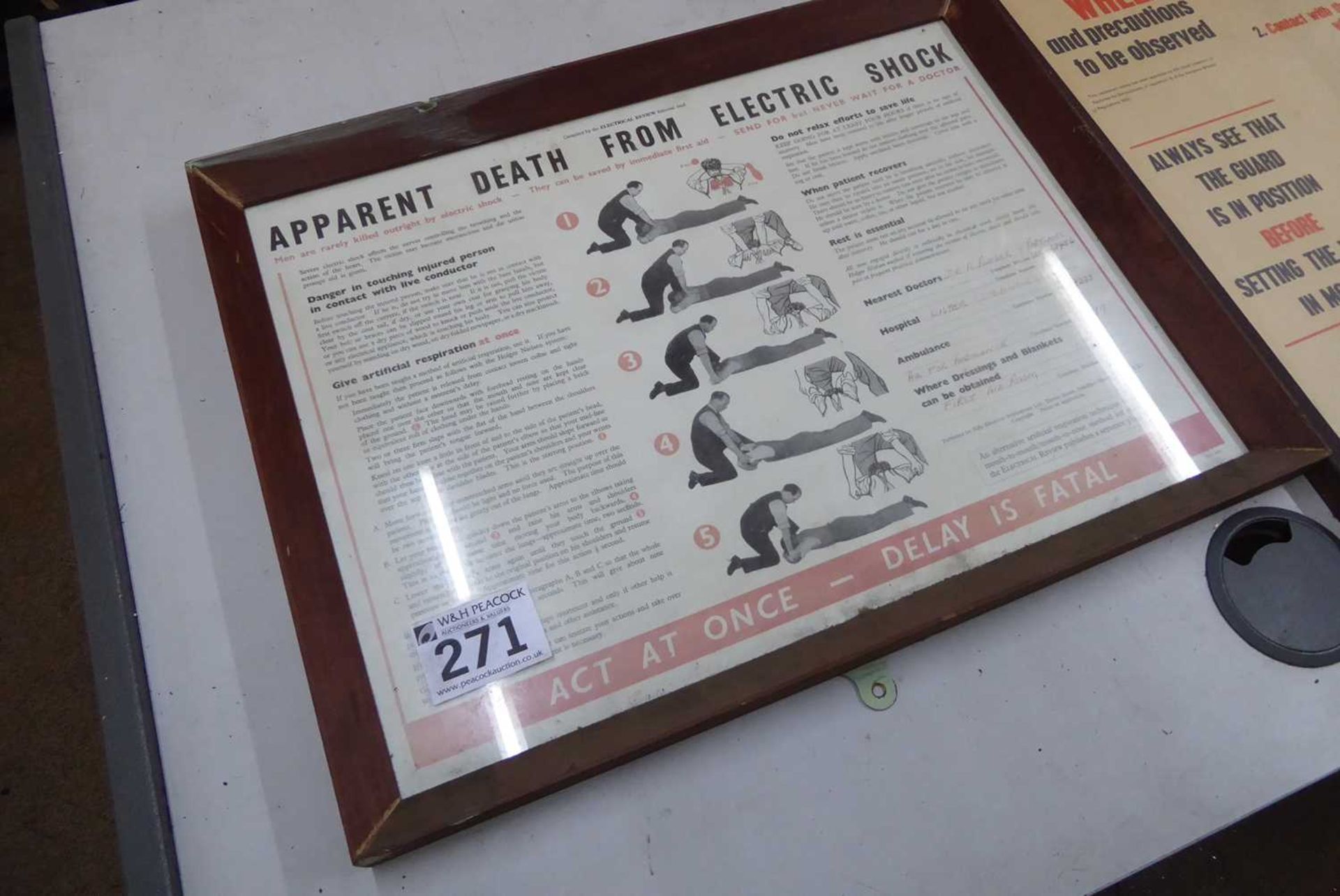 +VAT Framed safety poster "Apparent death from electric shock" together with another safety sign