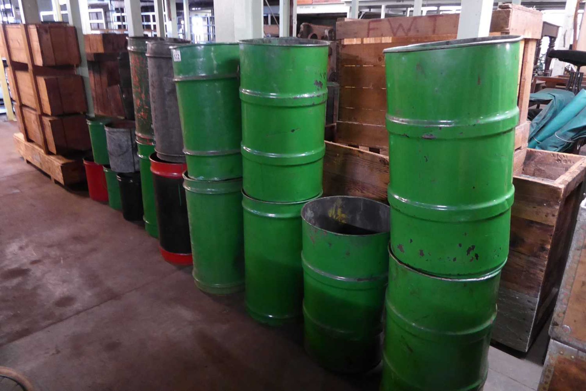 +VAT 16 assorted metal drums (previously used as waste bins)