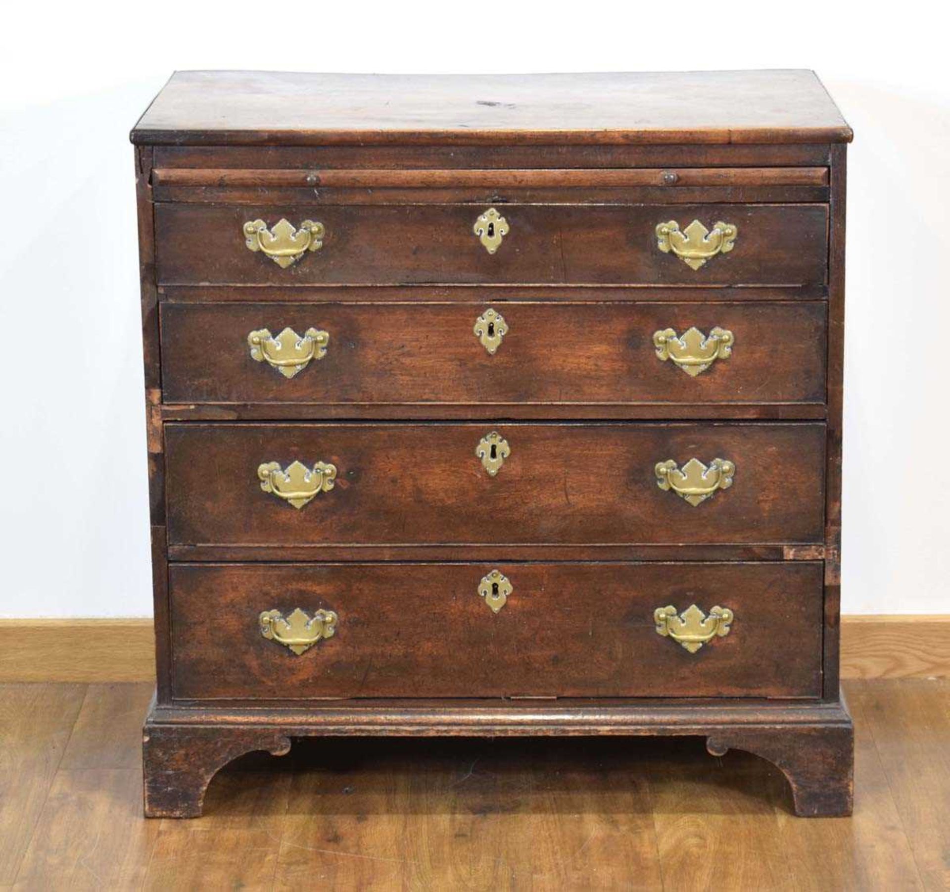 A George III mahogany bachelor's chest, the slide over four long graduated drawers, on bracket feet, - Image 2 of 4