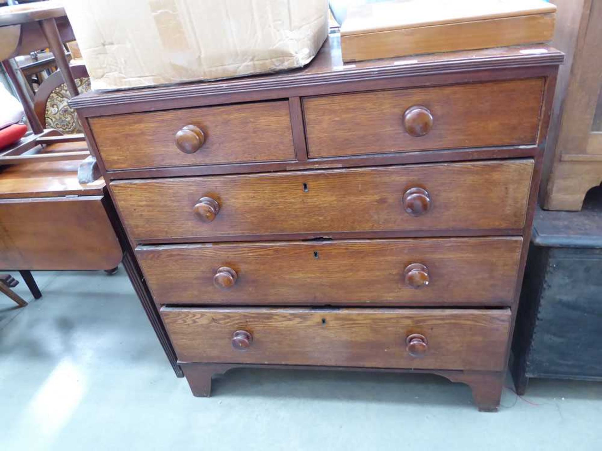 Oak chest of two over three drawers