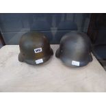 Pair of military helmets