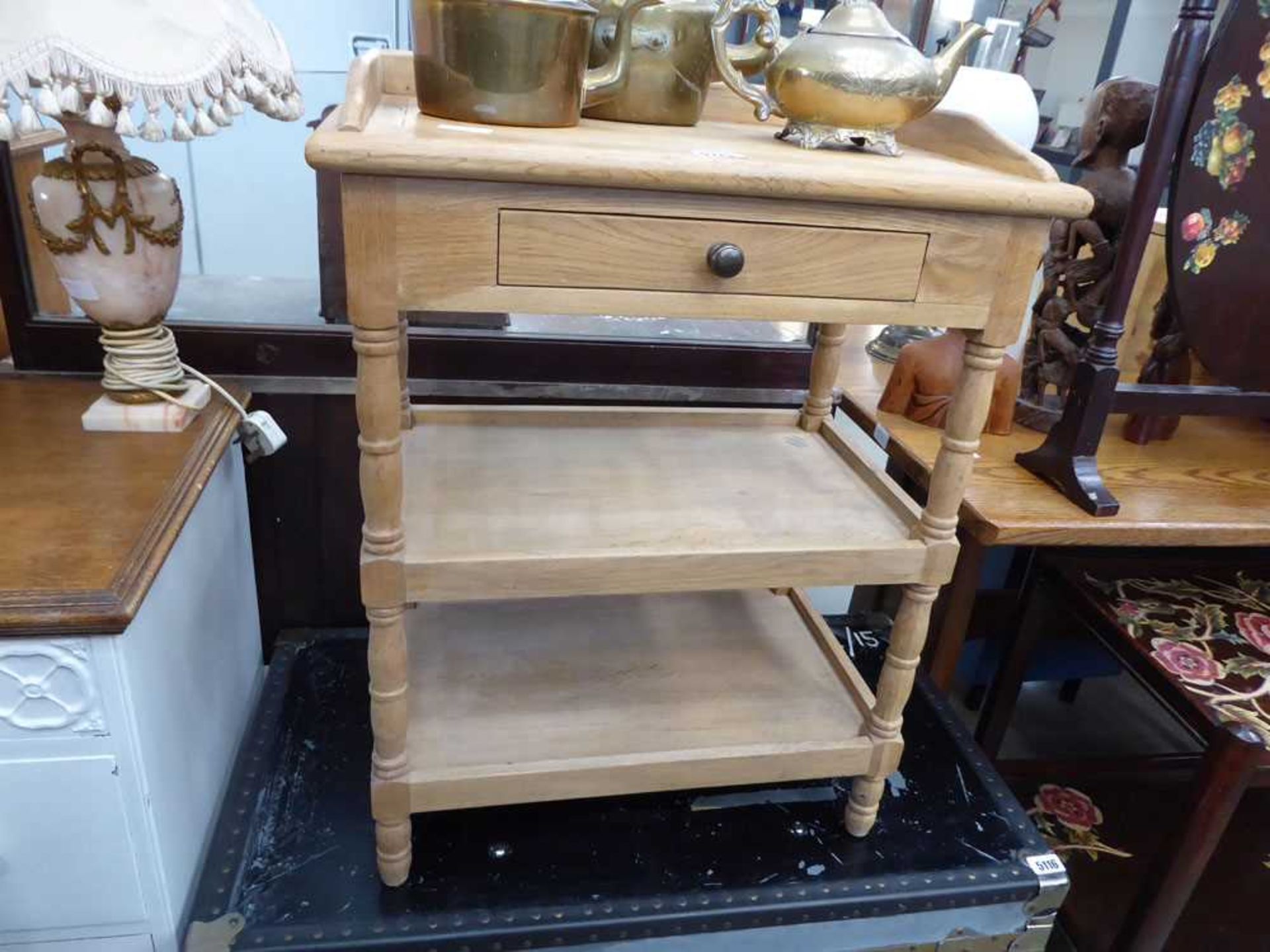 Oak two tier side table with drawer over