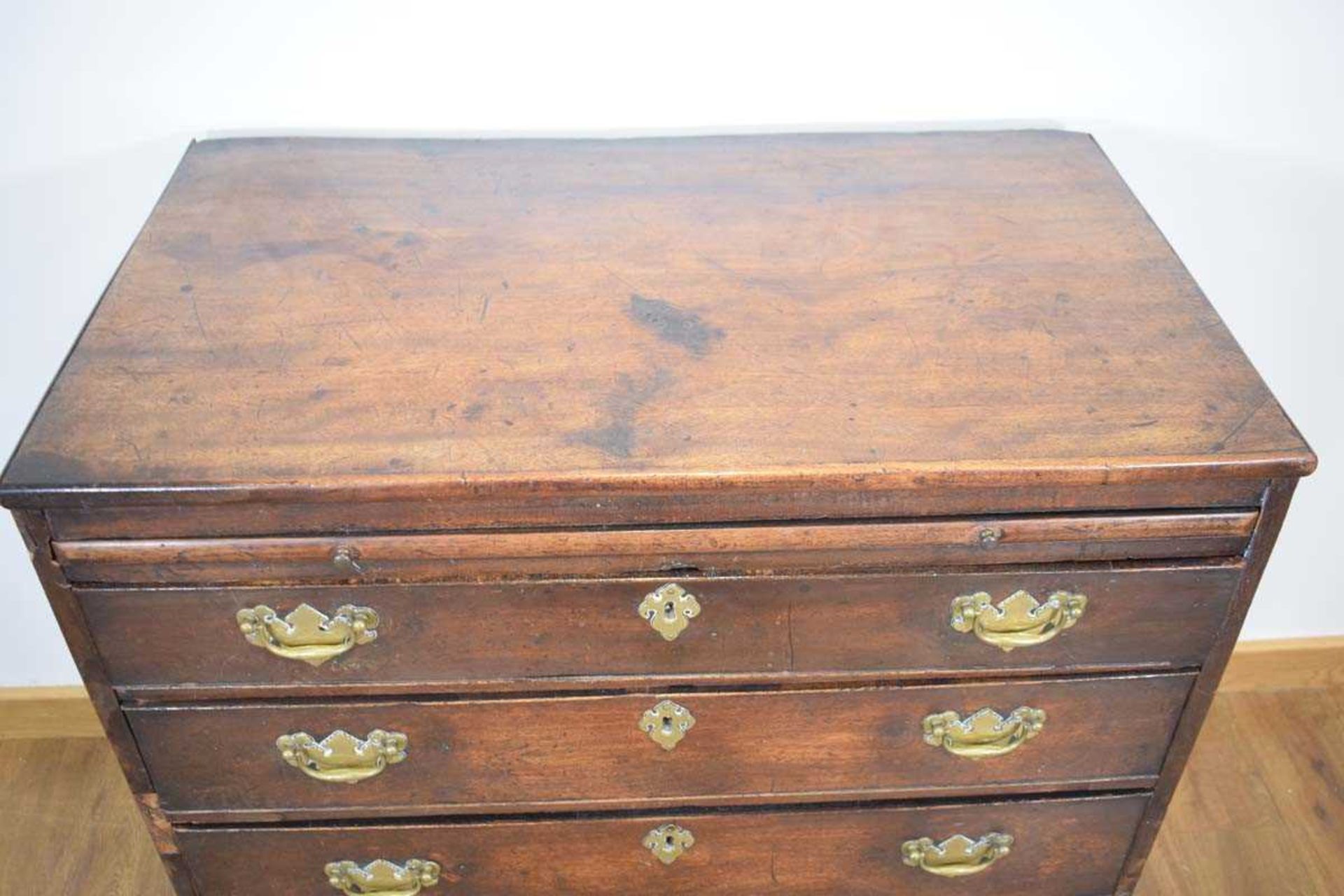 A George III mahogany bachelor's chest, the slide over four long graduated drawers, on bracket feet, - Image 3 of 4