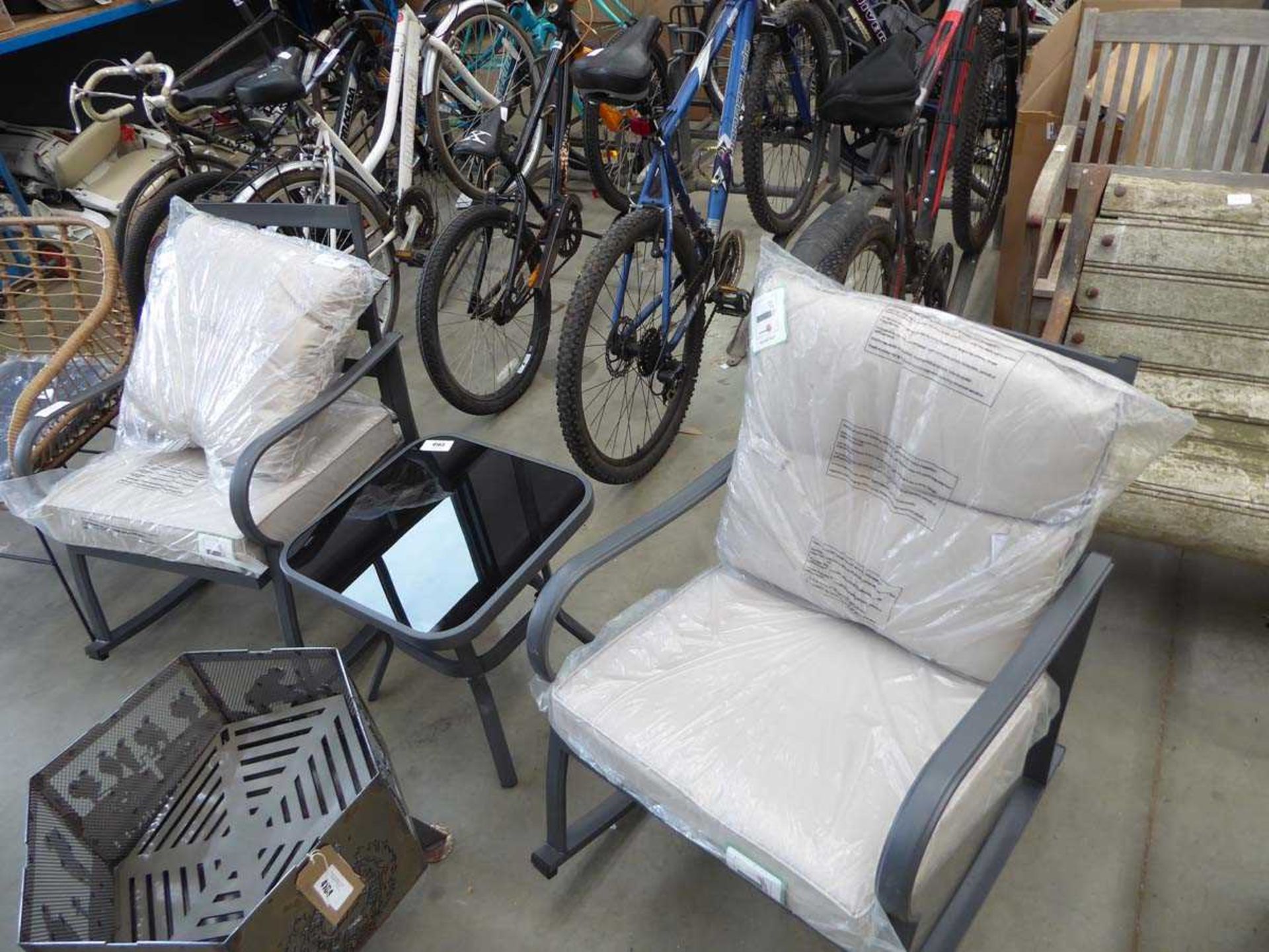 +VAT 2 metal framed rocking garden chairs and a small glass topped side table