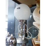 Chrome and perspex table lamp with globe shade