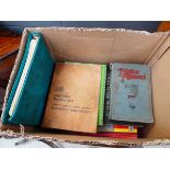 Box containing vintage motor manuals